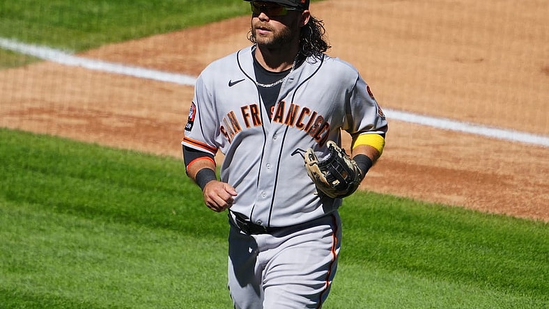 Sep 17, 2023; Denver, Colorado, USA; San Francisco Giants shortstop Brandon Crawford (35) leaves the field in the fourth inning against the Colorado Rockies at Coors Field. Mandatory Credit: Ron Chenoy-USA TODAY Sports
