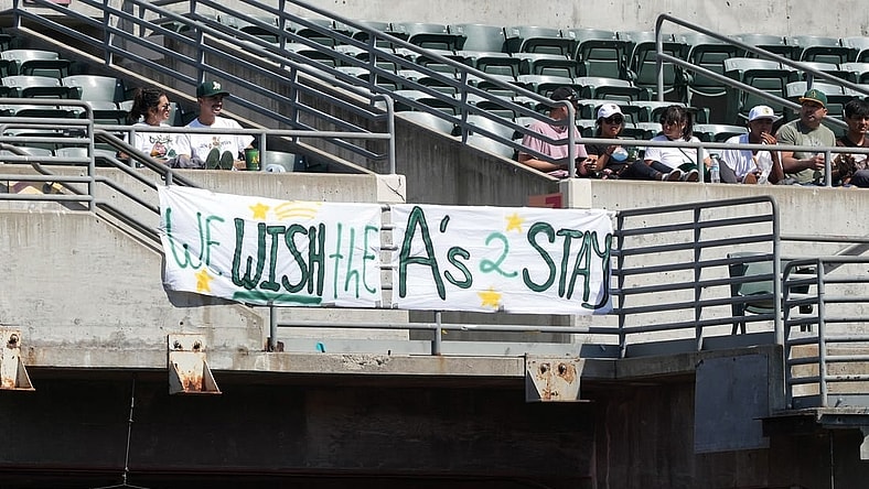 Sep 17, 2023; Oakland, California, USA; Oakland Athletics fans hang a sign in the right field bleachers during the fourth inning against the San Diego Padres at Oakland-Alameda County Coliseum. Mandatory Credit: Darren Yamashita-USA TODAY Sports