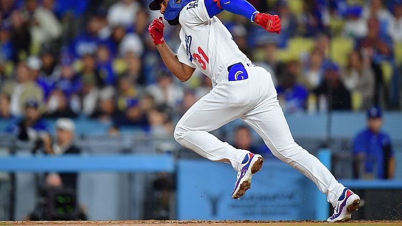 Sep 21, 2023; Los Angeles, California, USA; Los Angeles Dodgers second baseman Amed Rosario (31) runs after hitting a single against the San Francisco Giants during the fourth inning at Dodger Stadium. Mandatory Credit: Gary A. Vasquez-USA TODAY Sports