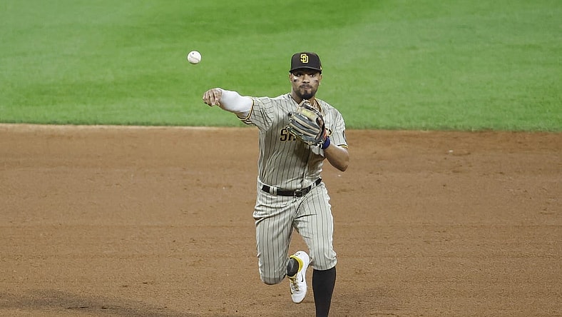 Sep 30, 2023; Chicago, Illinois, USA; San Diego Padres shortstop Xander Bogaerts (2) throws to first base for a Chicago White Sox out during the ninth inning at Guaranteed Rate Field. Mandatory Credit: Kamil Krzaczynski-USA TODAY Sports