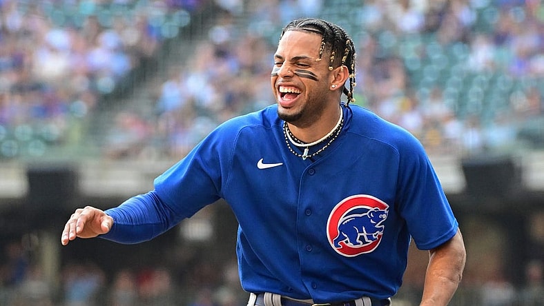 Oct 1, 2023; Milwaukee, Wisconsin, USA; Chicago Cubs shortstop Christopher Morel (5) jokes with teammates between innings against the Milwaukee Brewers at American Family Field. Mandatory Credit: Benny Sieu-USA TODAY Sports
