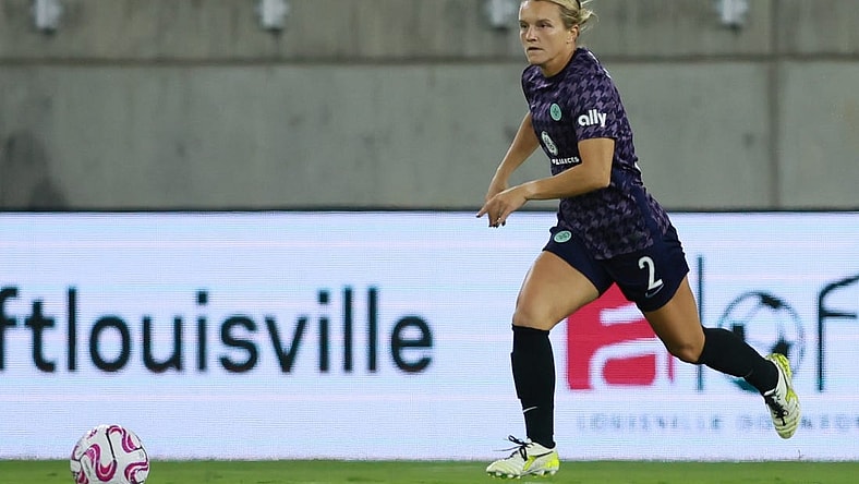 Oct 6, 2023; Louisville, Kentucky, USA; Racing Louisville's Lauren Milliet (2) looks to pass the ball in the first half against the Orlando Pride at Lynn Family Stadium. Mandatory Credit: EM Dash-USA TODAY Sports