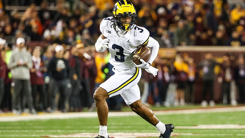 Oct 7, 2023; Minneapolis, Minnesota, USA; Michigan Wolverines defensive back Keon Sabb (3) returns an interception for a touchdown against the Minnesota Golden Gophers during the third quarter at Huntington Bank Stadium. Mandatory Credit: Matt Krohn-USA TODAY Sports