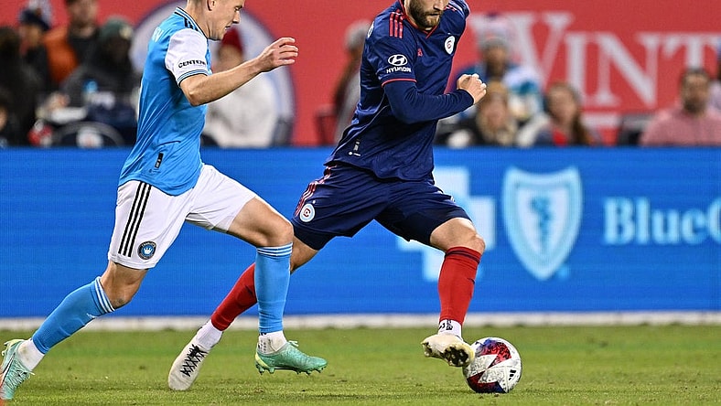 Oct 7, 2023; Chicago, Illinois, USA;  Chicago Fire FC forward Kacper Przybylko (11) controls the ball against Charlotte FC defender Jere Uronen (3) in the second half at Soldier Field. Mandatory Credit: Jamie Sabau-USA TODAY Sports