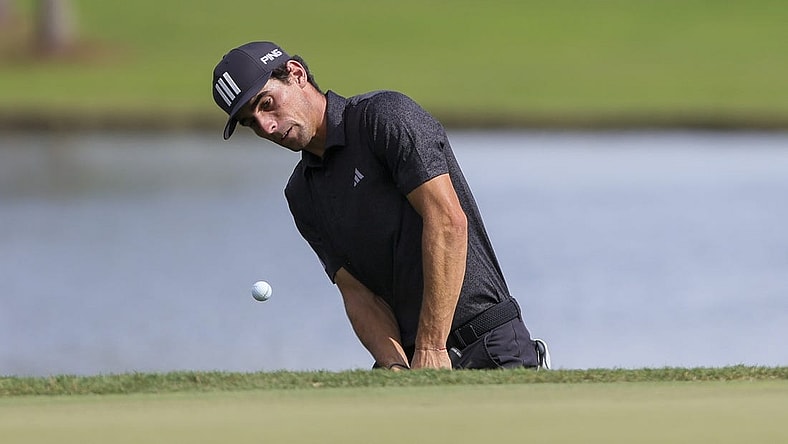 Oct 22, 2023; Doral, Florida, USA; Joaquin Niemann plays his shot on the seventh hole during the final round of the LIV Golf Miami golf tournament at Trump National Doral. Mandatory Credit: Sam Navarro-USA TODAY Sports
