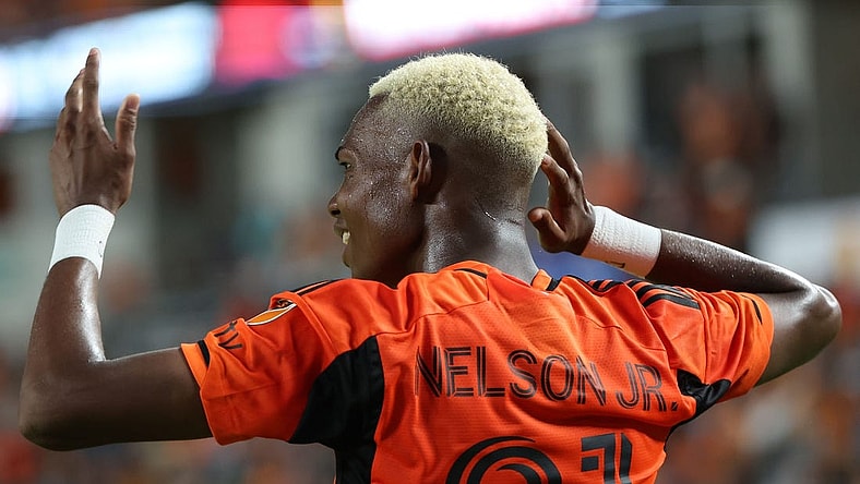Oct 29, 2023; Houston, TX, USA; Houston Dynamo forward Nelson Quinones (21) reacts against Real Salt Lake in the second half for game one in a round one match of the 2023 MLS Cup Playoffs at Shell Energy Stadium. Mandatory Credit: Thomas Shea-USA TODAY Sports