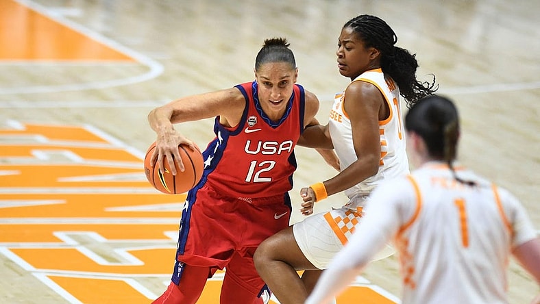 U.S. national team's Diana Taurasi (12) is guarded by Tennessee's Jewel Spear (0) during an exhibition basketball game on Sunday, November 5, 2023 In Knoxville, Tenn.