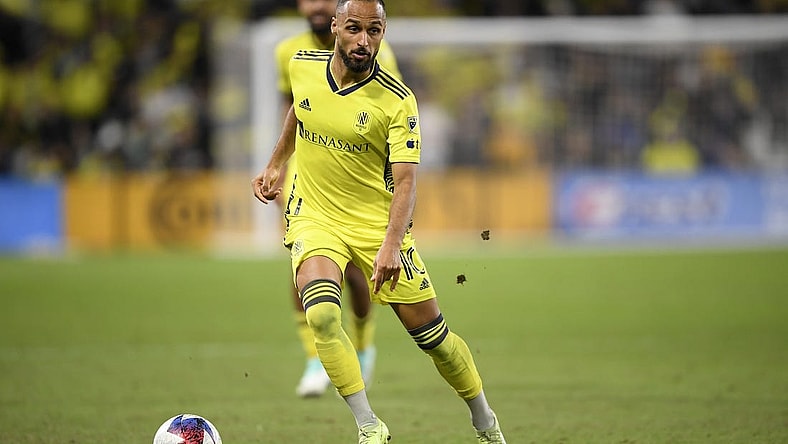Nov 7, 2023; Nashville, Tennessee, USA; Nashville SC midfielder Hany Mukhtar (10) controls the ball in the second half against the Orlando City SC at Geodis Park. Mandatory Credit: Steve Roberts-USA TODAY Sports