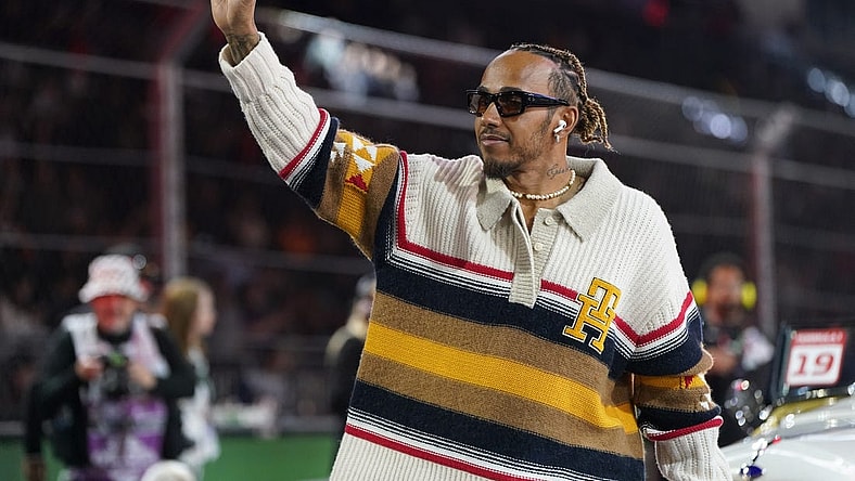 Nov 18, 2023; Las Vegas, Nevada, USA;  Mercedes AMG Petronas Motorsport driver Lewis Hamilton of Great Britain (44) waves to fans during the Formula 1 Heineken Silver Las Vegas Grand Prix begins at the Las Vegas Strip Circuit. Mandatory Credit: Lucas Peltier-USA TODAY Sports