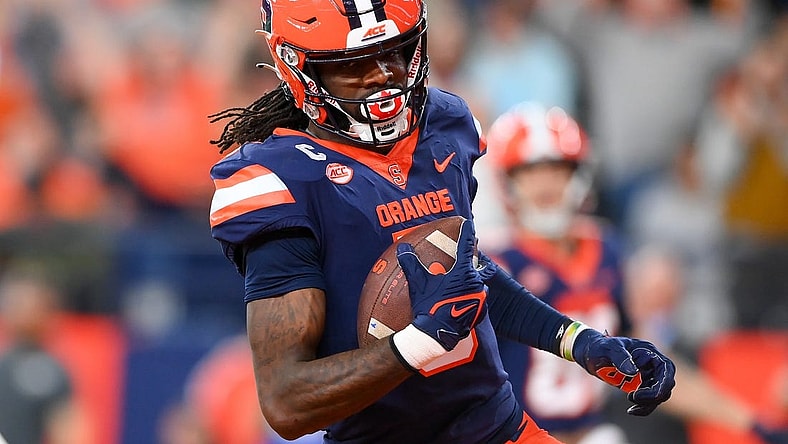 Nov 25, 2023; Syracuse, New York, USA; Syracuse Orange wide receiver Damien Alford (5) runs into the end zone for a touchdown against the Wake Forest Demon Deacons during the second half at the JMA Wireless Dome. Mandatory Credit: Rich Barnes-USA TODAY Sports