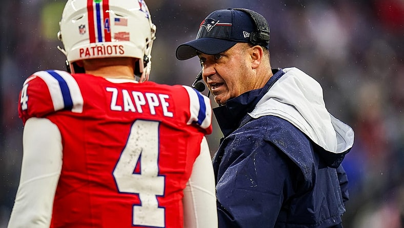 Dec 3, 2023; Foxborough, Massachusetts, USA; New England Patriots offensive coordinator Bill O'Brien talks with quarterback Bailey Zappe (4) as they take on the Los Angeles Chargers in the second quarter at Gillette Stadium. Mandatory Credit: David Butler II-USA TODAY Sports