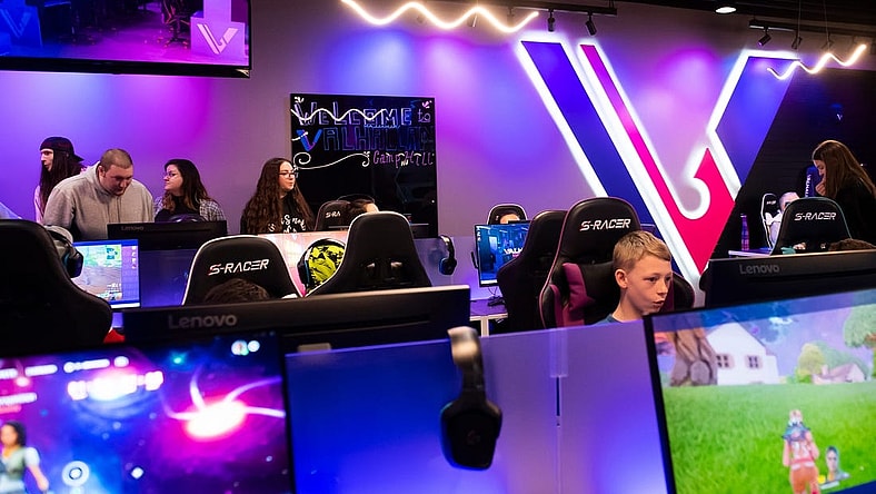 Young gamers play on PCs during a pre-grand opening event at Valhallan Esports Training on Thursday, Nov. 30, 2023, in Camp Hill.