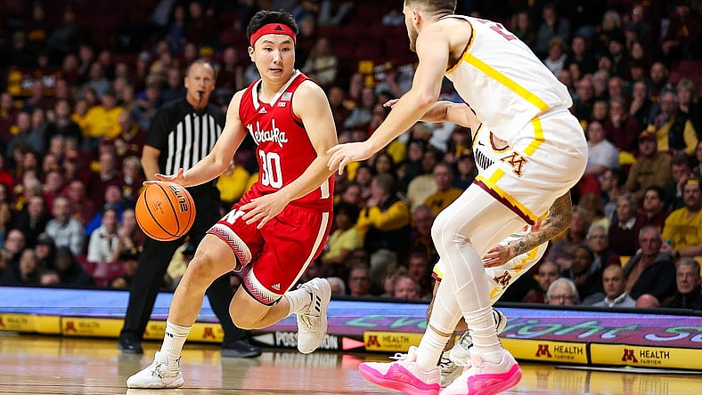 Dec 6, 2023; Minneapolis, Minnesota, USA; Nebraska Cornhuskers guard Keisei Tominaga (30) works around Minnesota Golden Gophers forward Parker Fox (23) during the second half at Williams Arena. Mandatory Credit: Matt Krohn-USA TODAY Sports