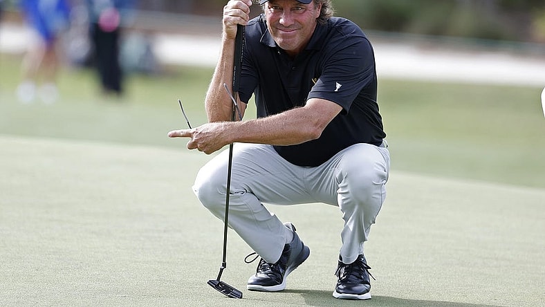 Dec 8, 2023; Bradenton, Florida, USA; Team International s Stephen Ames lines up a putt during their morning round at The Concession Golf Club. Mandatory Credit: Jeff Swinger-USA TODAY Sports