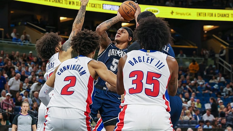 Dec 8, 2023; Orlando, Florida, USA; Orlando Magic forward Paolo Banchero (5) shoots the ball against the Detroit Pistons during the second quarter at Amway Center. Mandatory Credit: Mike Watters-USA TODAY Sports