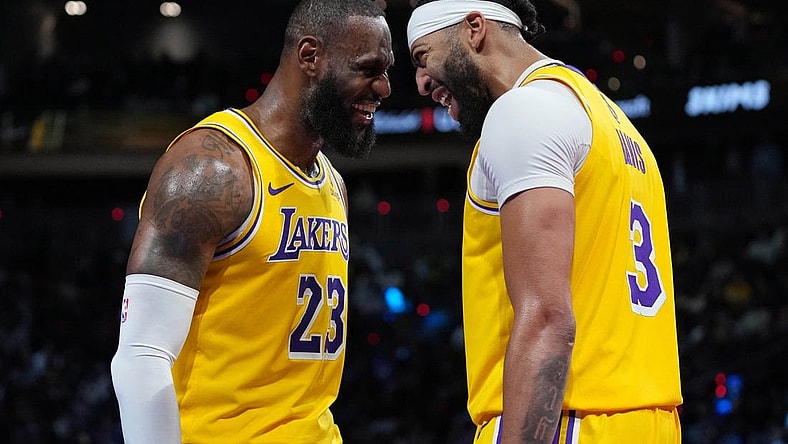 Dec 9, 2023; Las Vegas, Nevada, USA; Los Angeles Lakers forward LeBron James (23) and forward Anthony Davis (3) celebrate after winning the in season tournament championship final against the Indiana Pacers at T-Mobile Arena. Mandatory Credit: Kyle Terada-USA TODAY Sports