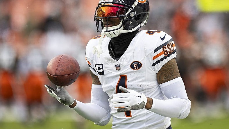 Dec 17, 2023; Cleveland, Ohio, USA; Chicago Bears safety Eddie Jackson (4) catches the ball during warm ups before the game against the Cleveland Browns at Cleveland Browns Stadium. Mandatory Credit: Scott Galvin-USA TODAY Sports