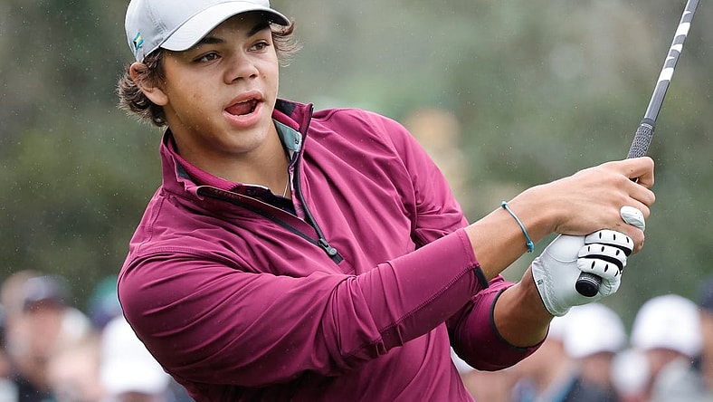 Dec 17, 2023; Orlando, Florida, USA;  Charlie Woods plays his shot from the first tee during the PNC Championship at The Ritz-Carlton Golf Club. Mandatory Credit: Reinhold Matay-USA TODAY Sports