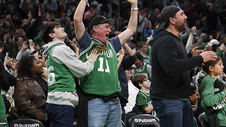 Dec 28, 2023; Boston, Massachusetts, USA;  Boston Celtics fans cheer during the second half against the Detroit Pistons at TD Garden. Mandatory Credit: Bob DeChiara-USA TODAY Sports