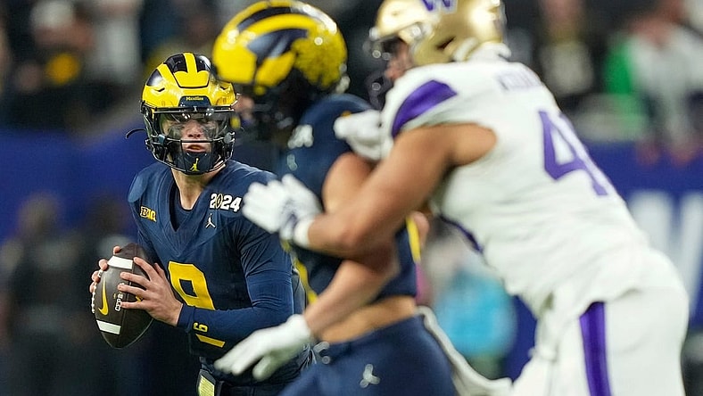 Michigan quarterback J.J. McCarthy (9) looks to pass the ball in the second half of the College Football Playoff national championship game against Washington at NRG Stadium in Houston, Texas on Monday, January 8, 2024.