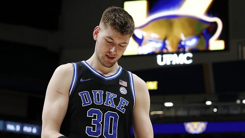Jan 9, 2024; Pittsburgh, Pennsylvania, USA;  Duke Blue Devils center Kyle Filipowski (30) reacts as he leaves the court after defeating the Pittsburgh Panthers at the Petersen Events Center. Duke won 75-53. Mandatory Credit: Charles LeClaire-USA TODAY Sports