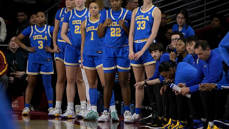 Jan 14, 2024; Los Angeles, California, USA; UCLA Bruins guard Londynn Jones (3), forward Angela Dugalic (32), forward Lina Sontag (21), guard Kiki Rice (1), forward Christeen Iwuala (22) and forward Amanda Muse (33) look on from the bench in the final seconds of the game at Galen Center. Mandatory Credit: Jayne Kamin-Oncea-USA TODAY Sports