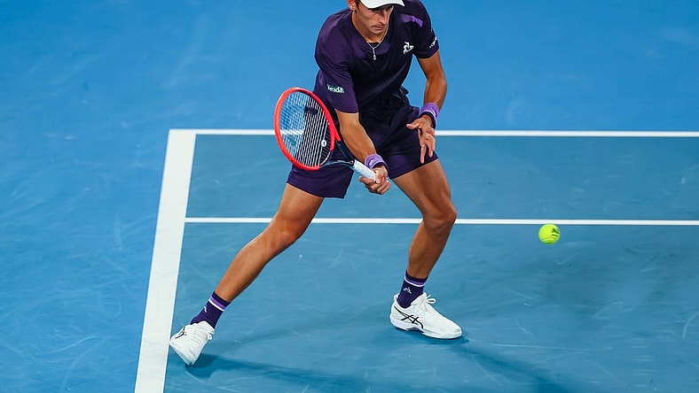 Jan 17, 2024; Melbourne, Victoria, Australia; Matteo Arnaldi of Italy plays a shot against Alex de Minaur (not pictured) of Australia in Round 2 of the Men's Singles on Day 4 of the Australian Open tennis at Rod Laver Arena. Mandatory Credit: Mike Frey-USA TODAY Sports