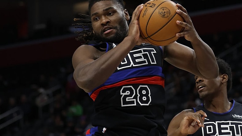 Jan 17, 2024; Detroit, Michigan, USA;  Detroit Pistons center Isaiah Stewart (28) grabs the rebound in the first half against the Minnesota Timberwolves at Little Caesars Arena. Mandatory Credit: Rick Osentoski-USA TODAY Sports