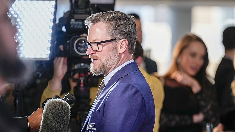Jan 19, 2024; Charlotte, NC, USA; Dale Earnhardt Jr. talks to interviewers during the red carpet at Charlotte Convention Center Crown Ballroom. Mandatory Credit: Jim Dedmon-USA TODAY Sports