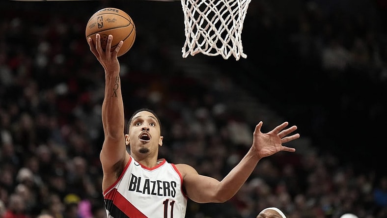 Jan 19, 2024; Portland, Oregon, USA; Portland Trail Blazers point guard Malcolm Brogdon (11) shoots the ball during the second half against the Indiana Pacers at Moda Center. Mandatory Credit: Soobum Im-USA TODAY Sports