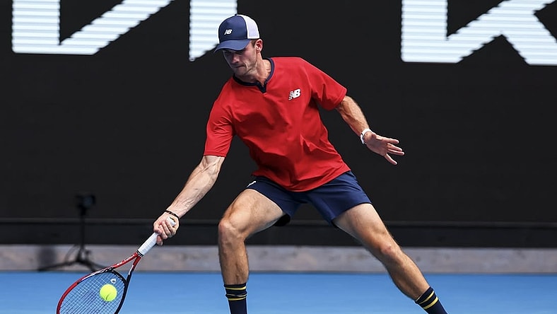 Jan 20, 2024; Melbourne, Victoria, Australia; Tommy Paul of the United States plays a shot against Miomir Kecmanovic (not pictured) of Serbia in Round 3 of the Men's Singles on Day 7 of the Australian Open tennis at Margaret Court Arena. Mandatory Credit: Mike Frey-USA TODAY Sports