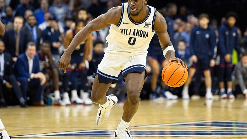 Jan 20, 2024; Philadelphia, Pennsylvania, USA; Villanova Wildcats guard TJ Bamba (0) dribbles the ball against the Connecticut Huskies during the second half at Wells Fargo Center. Mandatory Credit: Bill Streicher-USA TODAY Sports