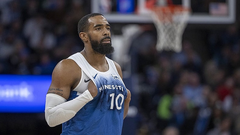 Jan 20, 2024; Minneapolis, Minnesota, USA; Minnesota Timberwolves guard Mike Conley (10) looks on against the Oklahoma City Thunder in the second half at Target Center. Mandatory Credit: Jesse Johnson-USA TODAY Sports