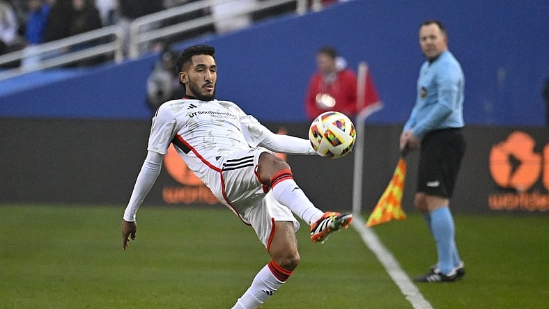 Jan 22, 2024; Dallas, TX, USA; FC Dallas forward Jesus Ferreira (10) attempts to keep the ball in bounds Monday during the first half at Cotton Bowl Stadium. Mandatory Credit: Jerome Miron-USA TODAY Sports