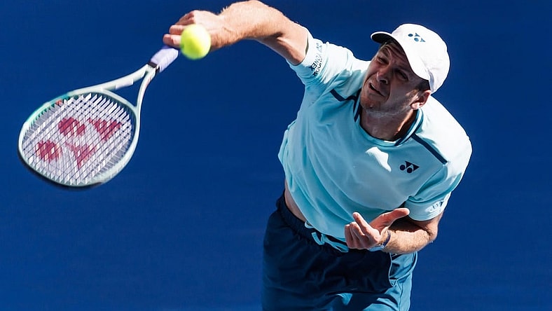 Jan 24, 2024; Melbourne, Victoria, Australia;  Hubert Hurkacz of Poland in action against Daniil Medvedev of Russia in the quarter final of the men   s singles at the Australian Open.Mandatory Credit: Mike Frey-USA TODAY Sports