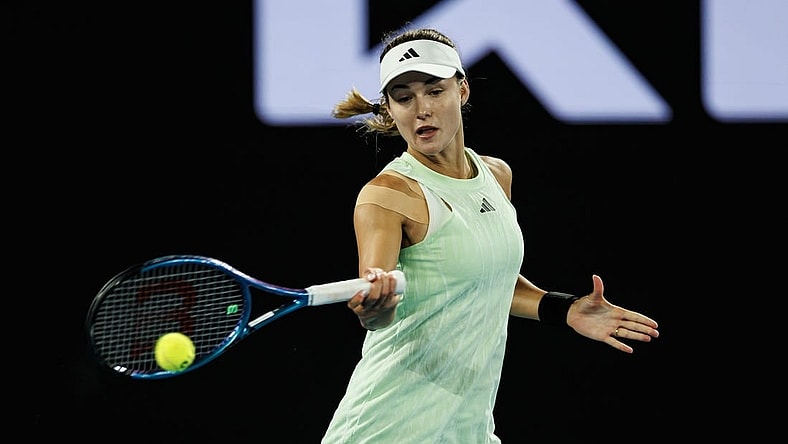 Jan 24, 2024; Melbourne, Victoria, Australia;  Anna Kalinskaya of Russia in action during her match against Qinwen Zheng of China in the quarter final of the women   s singles at the Australian Open.Mandatory Credit: Mike Frey-USA TODAY Sports