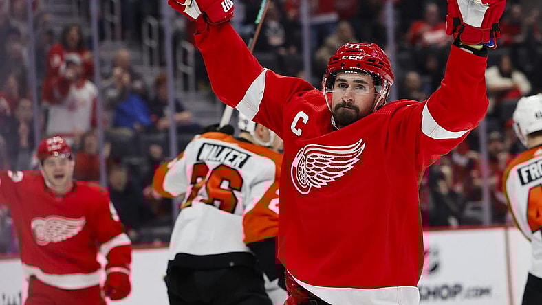 Jan 25, 2024; Detroit, Michigan, USA; Detroit Red Wings center Dylan Larkin (71) celebrates after he score a goal in the second period against the Philadelphia Flyers at Little Caesars Arena. Mandatory Credit: Rick Osentoski-USA TODAY Sports