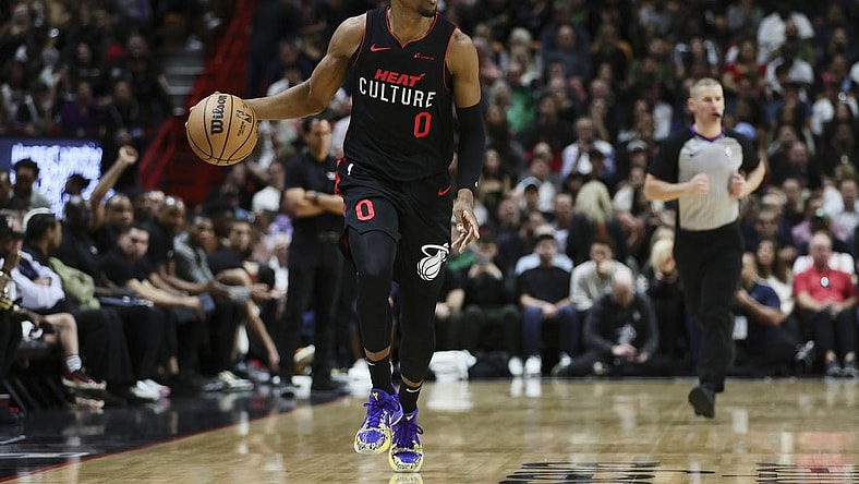 Jan 25, 2024; Miami, Florida, USA; Miami Heat guard Josh Richardson (0) dribbles the basketball against the Boston Celtics during the third quarter at Kaseya Center. Mandatory Credit: Sam Navarro-USA TODAY Sports