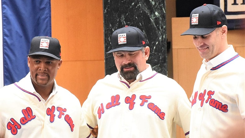 Adrian Beltre, Todd Helton and Joe Mauer (from left) visited the National Baseball Hall of Fame's plaque gallery in Cooperstown, New York, Thursday, Jan. 25, 2024, as the museum's newest electees. The trio's selection was announced Tuesday by the Baseball Writers Association of America.
