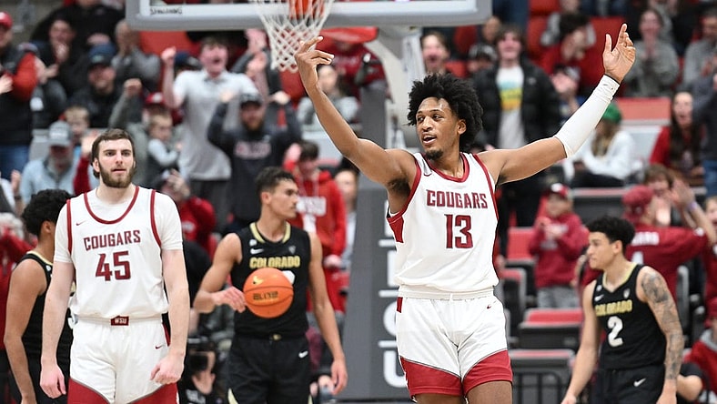 Jan 27, 2024; Pullman, Washington, USA; Washington State Cougars forward Isaac Jones (13) celebrates after a play against the Colorado Buffaloes in the second half at Friel Court at Beasley Coliseum. Washington State won 78-69. Mandatory Credit: James Snook-USA TODAY Sports