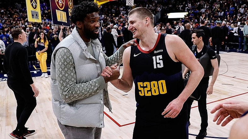 Jan 27, 2024; Denver, Colorado, USA; Philadelphia 76ers center Joel Embiid (21) and Denver Nuggets center Nikola Jokic (15) after the game at Ball Arena. Mandatory Credit: Isaiah J. Downing-USA TODAY Sports