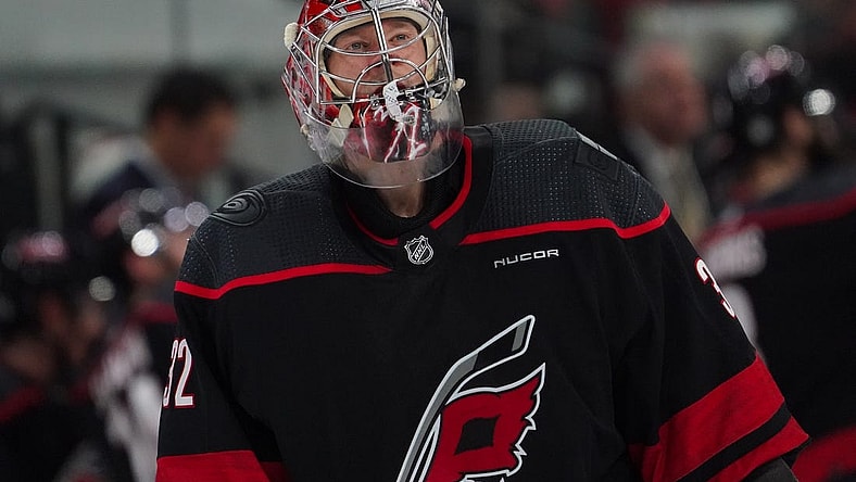 Jan 27, 2024; Raleigh, North Carolina, USA; Carolina Hurricanes goaltender Antti Raanta (32) looks on against the Arizona Coyotes during the second period at PNC Arena. Mandatory Credit: James Guillory-USA TODAY Sports