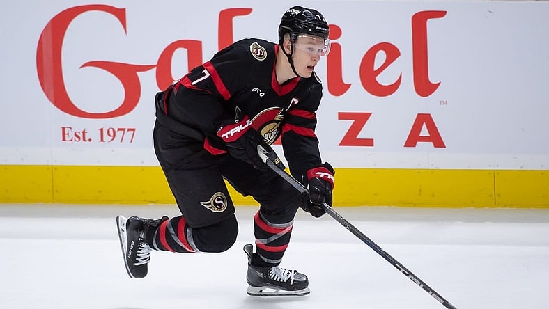 Jan 29, 2024; Ottawa, Ontario, CAN; Ottawa Senators left wing Brady Tkachuk (7) skates with the puck in overtime against the Nashville Predators at the Canadian Tire Centre. Mandatory Credit: Marc DesRosiers-USA TODAY Sports