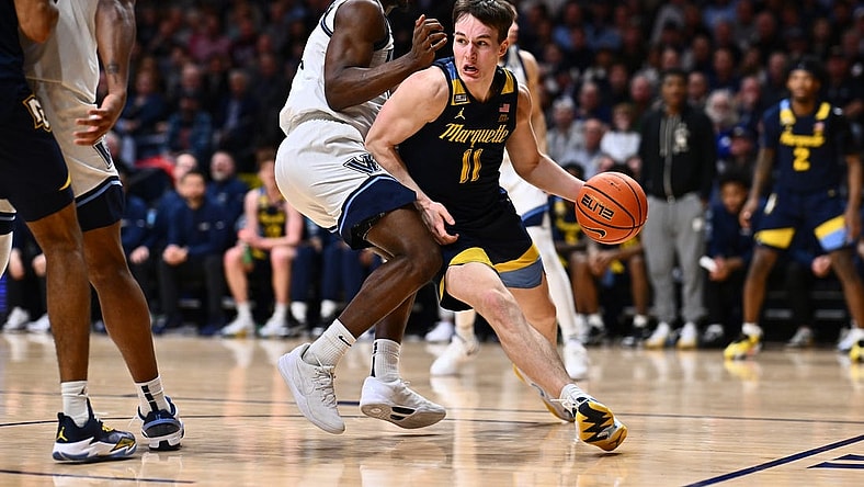 Jan 30, 2024; Villanova, Pennsylvania, USA; Marquette Golden Eagles guard Tyler Kolek (11) drives against Villanova Wildcats guard TJ Bamba (0) in the second half at William B. Finneran Pavilion. Mandatory Credit: Kyle Ross-USA TODAY Sports