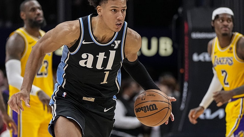 Jan 30, 2024; Atlanta, Georgia, USA; Atlanta Hawks forward Jalen Johnson (1) runs to the basket after stealing the ball against the Los Angeles Lakers during the second half at State Farm Arena. Mandatory Credit: Dale Zanine-USA TODAY Sports