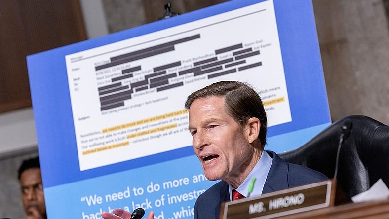Sen. Richard Blumenthal, R-CT, displays a sign with a redacted email from a Meta employee during a Senate Judiciary Committee hearing about Big Tech and the Online Child Sexual Exploitation Crisis on January 31, 2024, at Capitol Hill in Washington, DC.