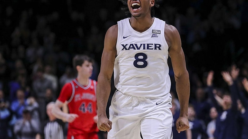 Jan 31, 2024; Cincinnati, Ohio, USA; Xavier Musketeers guard Quincy Olivari (8) reacts after making a 3-point basket against the St. John's Red Storm in the second half at Cintas Center. Mandatory Credit: Katie Stratman-USA TODAY Sports