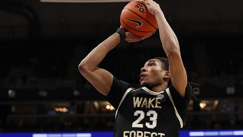 Jan 31, 2024; Pittsburgh, Pennsylvania, USA; Wake Forest Demon Deacons guard Hunter Sallis (23) shoots against the Pittsburgh Panthers during the second half at the Petersen Events Center. Pittsburgh won 77-72.  Mandatory Credit: Charles LeClaire-USA TODAY Sports