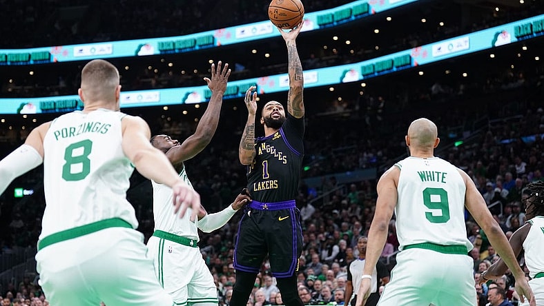Feb 1, 2024; Boston, Massachusetts, USA; Los Angeles Lakers guard D'Angelo Russell (1) shoots against the Boston Celtics in the first quarter at TD Garden. Mandatory Credit: David Butler II-USA TODAY Sports