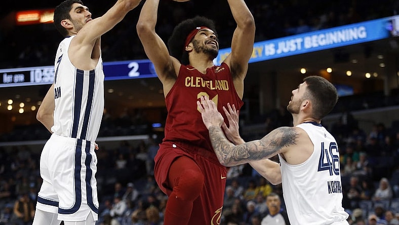 Feb 1, 2024; Memphis, Tennessee, USA; Memphis Grizzlies forward-center Santi Aldama (7) blocks the shot of Cleveland Cavaliers center Jarrett Allen (31) during the first half at FedExForum. Mandatory Credit: Petre Thomas-USA TODAY Sports